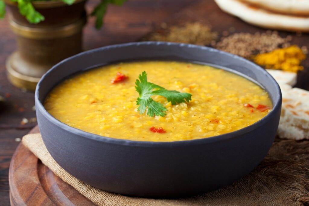 Red lentil Indian soup with flat bread Masoor dal